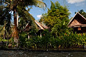 Scenery along the canal leading to Damnoen Saduak Floating Market. 